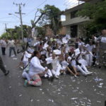 The Ladies in White, an opposition group, protest on a street in Havana