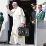Pope Francis waves as he boards a plane at Fiumicino Airport in Rome September 19, 2015. REUTERS/Giampiero Sposito