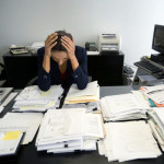 woman-stressed-at-work-skin-agers-dg-pg-full