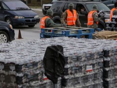 Walmart, others promise water to Flint