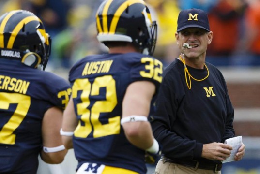 Jim Harbaugh is one of the many football coaches going to great lengths to sign players