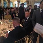 Donald Trump listening to speakers