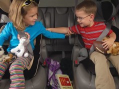 children in backseat of car