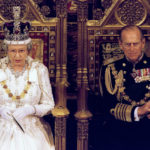 Queen Elizabeth II, accompanied by Prince Philip, sits in the House of Lords before delivering her s..