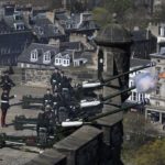 Gunners fire a twenty-one gun salute in honour of Britain’s Queen Elizabeth 90th birthday celebrations at Mills Mount Battery at Edinburgh Castle in Scotland