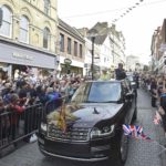 Britain’s Queen Elizabeth and Prince Philip are driven past well-wishers during celebrations for the Queen’s 90th birthday, in Windsor, Britain