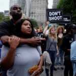 People take part in a protest against police brutality and in support of Black Lives Matter in New York