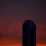 The Bank of America building is lit up in blue, the traditional color of police uniforms as a tribute following the multiple police shootings in Dallas