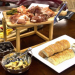 Prosciutto, Speck, milk-braised Coppa, and Serrano ham with Parmesan, Moody Blue, Irish Cheddar, Gloucester and Pecorino-Romano cheeses, Cerignola onions with a lemon-infused Balsamic vinaigrette and Roman long-stemmed artichoke hearts with sun-dried tomatoes and Tribeca bread. CBI test kitchen.
