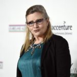 Honoree Carrie Fisher poses at the Oscar Wilde Awards at director J.J. Abrams’ Bad Robot production company in Santa Monica
