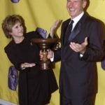 HARRISON FORD AND CARRIE FISHER POSE DURING BAFTA AWARDS.