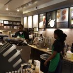 Baristas assisting customers ©SouthFloridaReporter.com