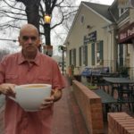 Bill Lewis and his cup of “most expensive Starbucks coffee” ©SouthFloridaReporter.com