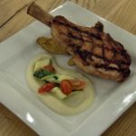 Veal chop with parsnip puree and roasted potatoes
