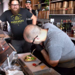 Melting the cheese on the Bratwurst