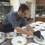 Chef Roland preparing dishes
