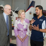 George Weaver, trustee of the Emil Buehler Perpetual Trust, Helen Weaver, Oscar Romo, aviation student