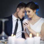 storyblocks/Close up of dating couple at dinner