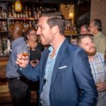 Greg Smith of QTEGO samples fine bourbon.