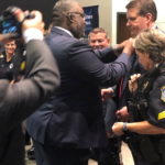 B – Keith Williams pins CCPD Chief Butch Arenal