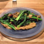 Chinese broccoli, pork and black garlic with peanut butter