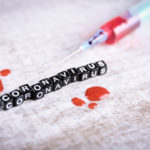 concept-coronavirus-mers-cov-middle-east-respiratory-syndrome-coronavirus-inscription-syringe-blood-wooden-table_150455-725