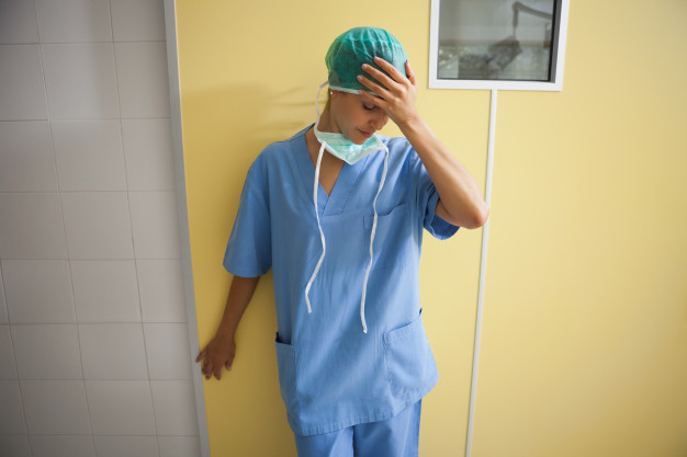 freepik/nurse-scrubs-looking-worried_13339-275861