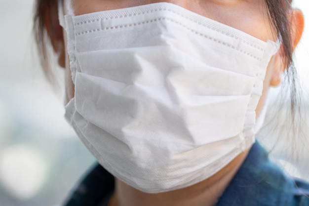 freepik/woman-wearing-face-mask-protect-filter-against-air-pollution-pm2-5_24901-2072
