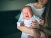 ADONIS Surrogacy Clinic in Ukraine freepik/portrait-newborn-baby-mother-holds-child-her-arms-newborn-is-screaming-stomach-pain-childhood-cramps-crying-newborn-baby-first-year-life-is-restless_186523-194