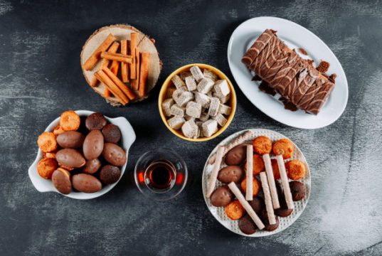 https://www.freepik.com/free-photo/cookies-plates-bowl-with-roulade-waffles-top-view-black-textured_7711624.htm