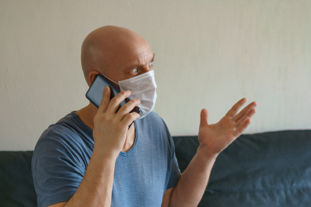 FREEPIK/man-is-sitting-sofa-protective-mask-with-laptop-phone-remote-work-quarantine_78492-3653 https://www.freepik.com/premium-photo/man-is-sitting-sofa-protective-mask-with-laptop-phone-remote-work-quarantine_9100712.htm#page=1&query=COVID%20BALD&position=4