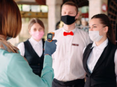 https://www.freepik.com/premium-photo/manager-restaurant-hotel-checks-body-temperature-staff-with-thermal-imaging-device_7975717.htm