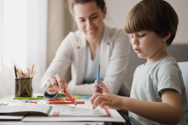 https://www.freepik.com/free-photo/side-view-child-studying-home-with-help-tutor_7871324.htm