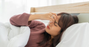 https://www.freepik.com/premium-photo/asian-woman-headache-sleeping-bed_9077218.htm#page=1&query=adult%20sick%20person&position=40