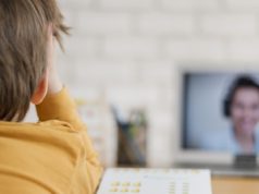 https://www.freepik.com/free-photo/back-view-child-being-tutored-home-through-online-class_7871373.htm