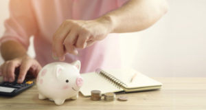 https://www.freepik.com/premium-photo/hand-putting-money-coin-into-piggy-bank-saving-money-future-investment-concept_7484602.htm