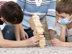 https://www.freepik.com/free-photo/kids-with-medical-masks-playing-jenga-with-mother_7747088.htm