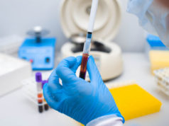 https://www.freepik.com/premium-photo/lab-technician-dripping-blood-into-test-tube-from-dispenser_7125741.htm