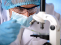https://www.freepik.com/premium-photo/man-mask-glasses-is-experimenting-with-microscope_5170373.htm#page=1&query=laboratory&position=46