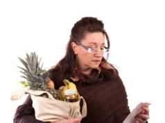 https://www.storyblocks.com/images/stock/middle-aged-woman-carefully-examining-her-register-receipt-reviewing-her-grocery-shopping-bill-btnbrw0ssiskjtfr2