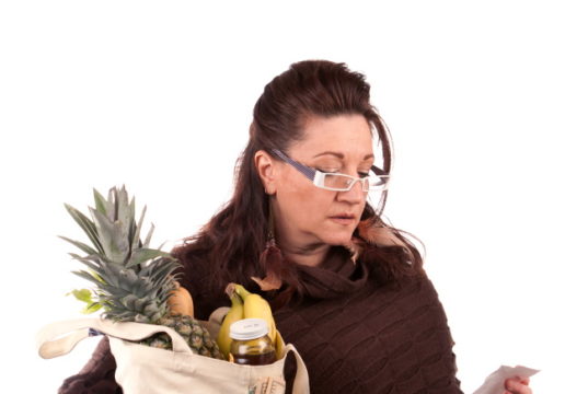 https://www.storyblocks.com/images/stock/middle-aged-woman-carefully-examining-her-register-receipt-reviewing-her-grocery-shopping-bill-btnbrw0ssiskjtfr2