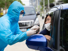 https://www.freepik.com/premium-photo/nurse-wearing-ppe-suit-medical-workers-full-protective-gear-takes-sample-from-woman-driver-inside-car-drive-thru-test-coronavirus-covid-19_8315205.htm