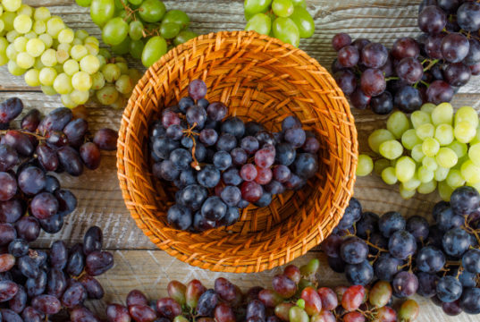 https://www.freepik.com/free-photo/ripe-grapes-wicker-basket-wooden-background-flat-lay_9691623.htm