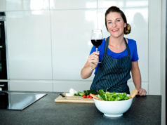 https://www.freepik.com/premium-photo/smiling-woman-kitchen-preparing-vegetables-drinking-red-wine_5419159.htm