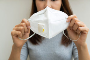 https://www.freepik.com/premium-photo/woman-hands-holding-protective-face-mask-prevent-pollution-disease-concept_7350830.htm