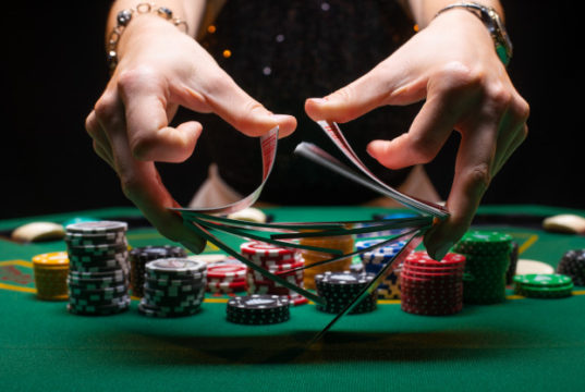 https://www.freepik.com/premium-photo/girl-croupier-shuffles-poker-cards-casino_5718688.htm