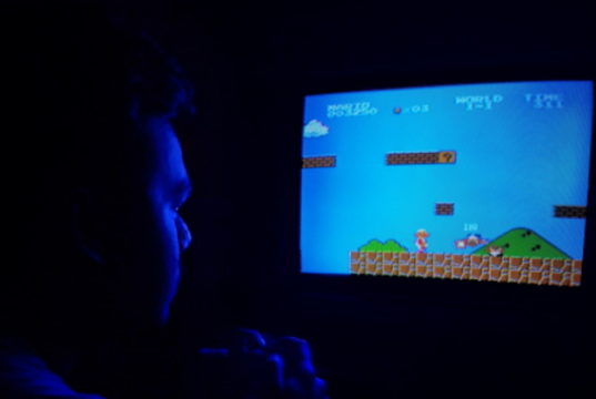 https://www.pexels.com/photo/photo-of-man-playing-super-mario-bros-2728255/