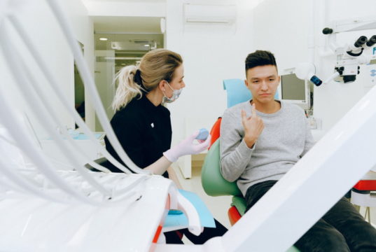 https://www.pexels.com/photo/man-in-gray-shirt-having-dental-check-up-3845807/