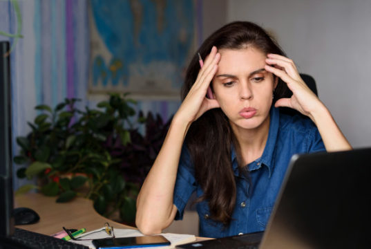 https://www.freepik.com/premium-photo/stressed-young-woman-sitting-her-desk-front-computer_9231533.htm