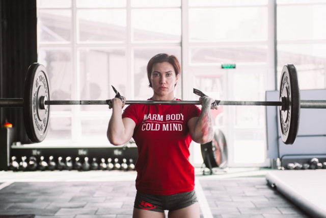 client website/weightlifting woman